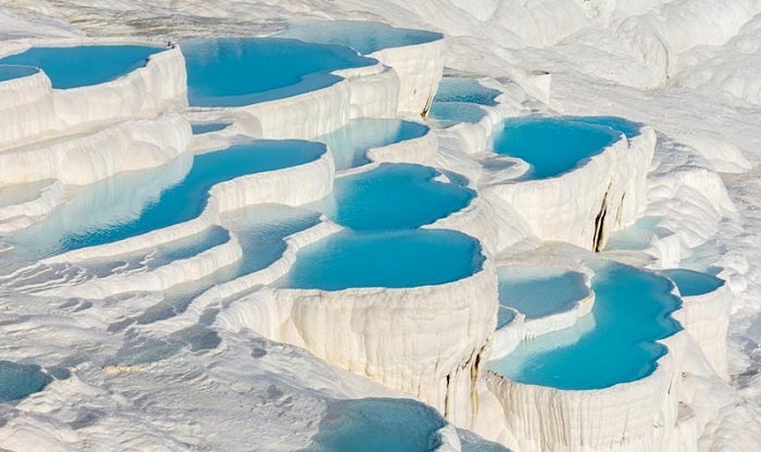 Pamukkale, which has a unique beauty and hosts the Cleapatra Pool and the Ancient City of Hierapolis, is at Kings World Travel with an affordable price